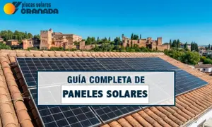 Guía completa de paneles solares en tejados, con la Alhambra de fondo. Información sobre la normativa de instalación de placas solares en comunidades de vecinos.